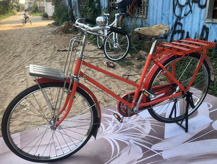 xe đạp thư báo nhật bãi